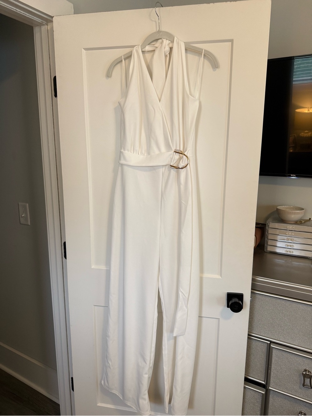 Elegant White Halter Jumpsuit with Gold Buckle Belt